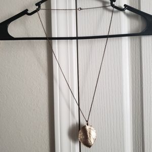 Gold leaf pendant necklace.